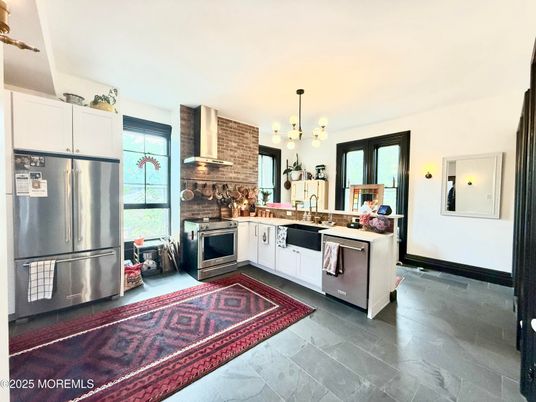 Interior, Kitchen, Pendant Lights, Stainless Steel Appliances, Stone Walls