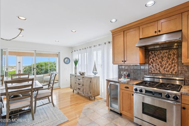 Dining room, Interior, Kitchen, Recessed Lighting, Stainless Steel Appliances, Wood Texture Flooring