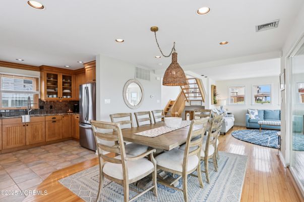Dining room, Interior, Kitchen, Living room, Pendant Lights, Recessed Lighting, Stainless Steel Appliances, Wood Texture Flooring