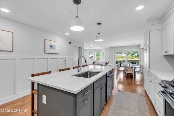 Dining room, Interior, Kitchen, Pendant Lights, Recessed Lighting, Stainless Steel Appliances, Wood Texture Flooring