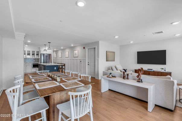Dining room, Interior, Kitchen, Living room, Pendant Lights, Recessed Lighting, Stainless Steel Appliances, Wood Texture Flooring