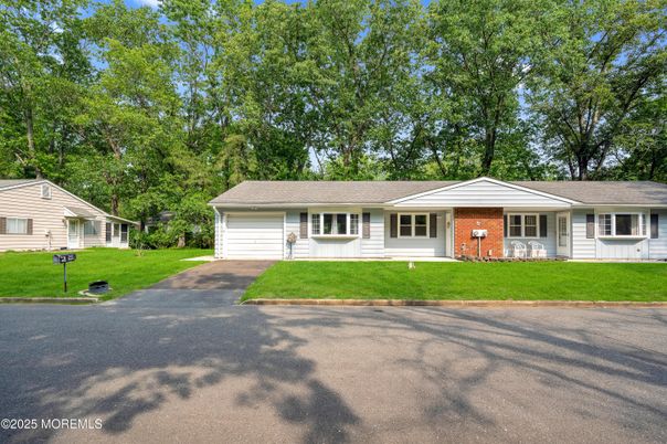 Attached, Backyard, Exterior, Facade, Brick Facade, Ranch