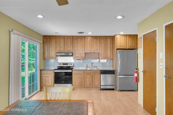 Interior, Kitchen, Recessed Lighting, Stainless Steel Appliances, Wood Texture Flooring