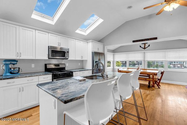 Dining room, Glass Ceilings, Interior, Kitchen, Stainless Steel Appliances, Wood Texture Flooring