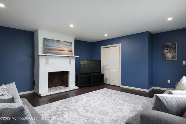Bedroom, Fireplace, Interior, Recessed Lighting, Wood Texture Flooring