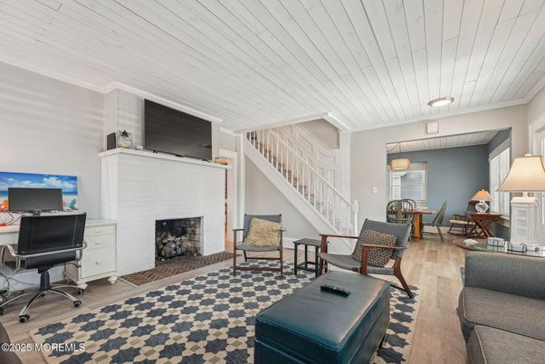 Fireplace, Home Office, Interior, Living room, Pendant Lights, Wood Texture Flooring