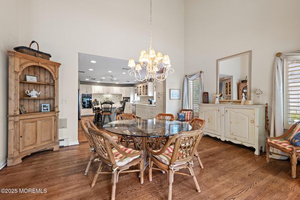 Chandelier, Dining room, Interior, Kitchen, Recessed Lighting, Stainless Steel Appliances, Wood Texture Flooring
