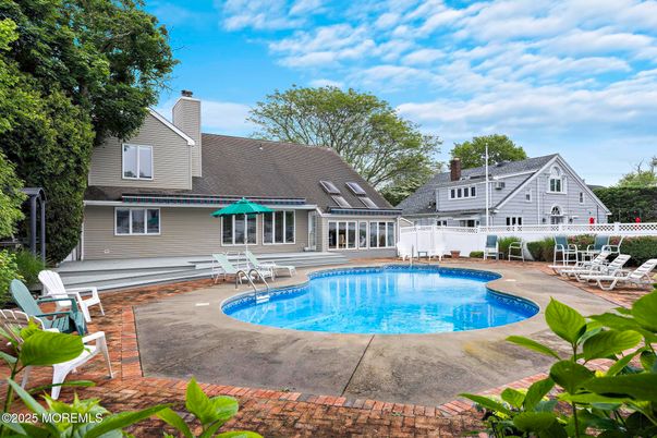 Exterior, Pool, Solar Panels
