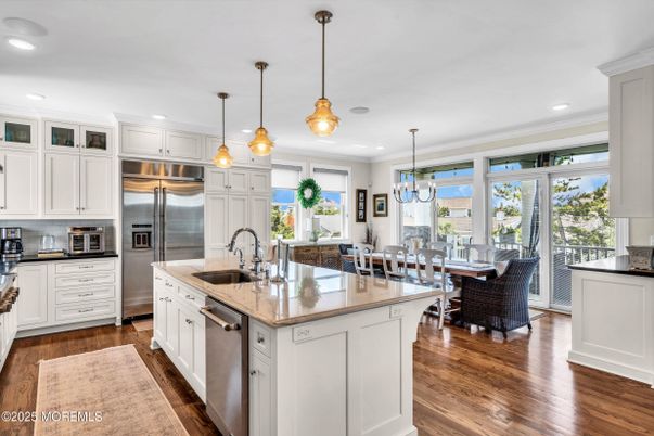 Dining room, Interior, Kitchen, Pendant Lights, Recessed Lighting, Stainless Steel Appliances, Wood Texture Flooring