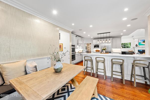 Dining room, Interior, Kitchen, Pendant Lights, Recessed Lighting, Stainless Steel Appliances, Wood Texture Flooring
