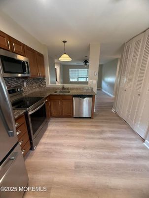 Interior, Kitchen, Pendant Lights, Stainless Steel Appliances, Wood Texture Flooring