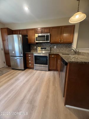 Interior, Kitchen, Pendant Lights, Recessed Lighting, Stainless Steel Appliances, Wood Texture Flooring