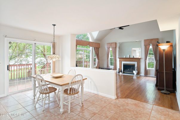 Dining room, Fireplace, Interior, Pendant Lights, Wood Texture Flooring