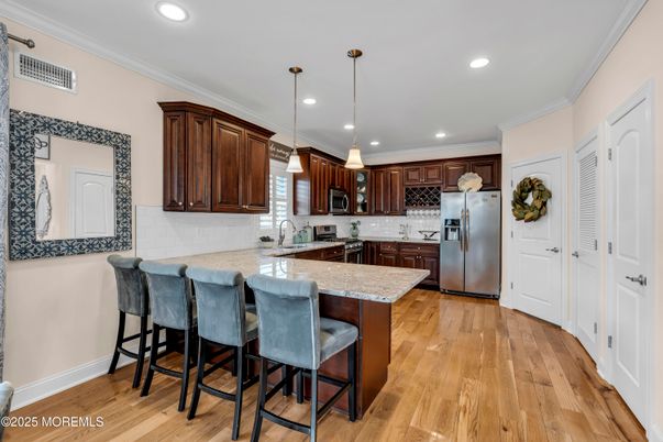 Interior, Kitchen, Pendant Lights, Recessed Lighting, Stainless Steel Appliances, Wood Texture Flooring