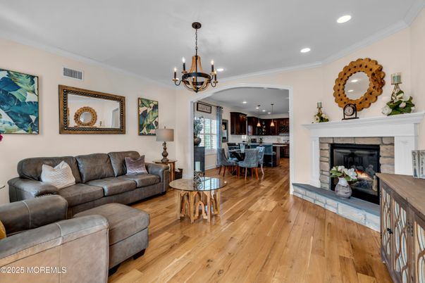 Chandelier, Dining room, Fireplace, Interior, Kitchen, Living room, Pendant Lights, Recessed Lighting, Wood Texture Flooring