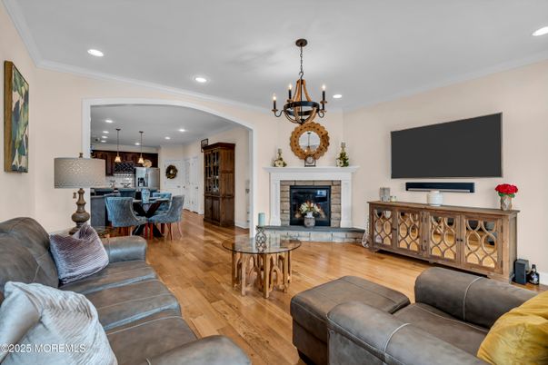 Chandelier, Dining room, Fireplace, Interior, Kitchen, Living room, Pendant Lights, Recessed Lighting, Wood Texture Flooring