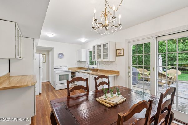 Chandelier, Dining room, Interior, Wood Texture Flooring