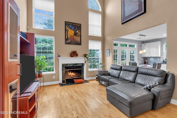 Dining room, Fireplace, Interior, Living room, Pendant Lights, Recessed Lighting, Wood Texture Flooring