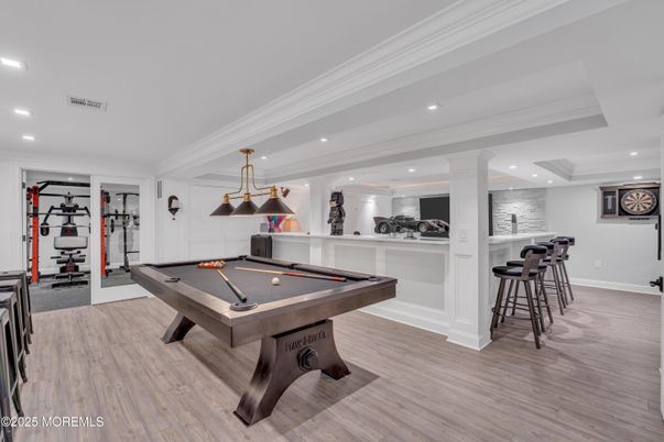 Billiard Table, Fitness Equipment, Game Room, Interior, Pendant Lights, Recessed Lighting, Wood Texture Flooring