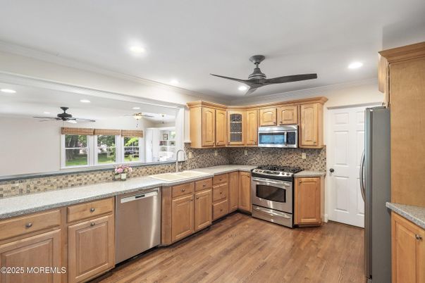 Interior, Kitchen, Recessed Lighting, Stainless Steel Appliances, Wood Texture Flooring