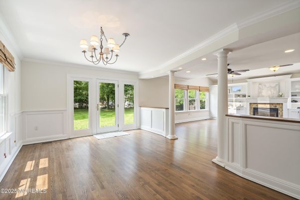 Chandelier, Empty room, Fireplace, Interior, Recessed Lighting, Wood Texture Flooring