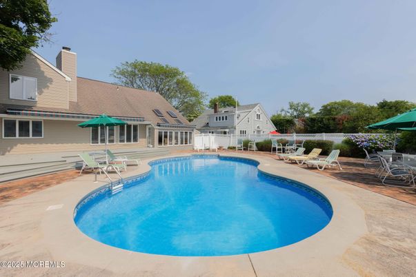 Exterior, Pool, Solar Panels