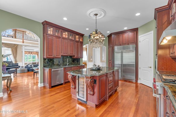 Chandelier, Interior, Kitchen, Recessed Lighting, Stainless Steel Appliances, Wood Texture Flooring