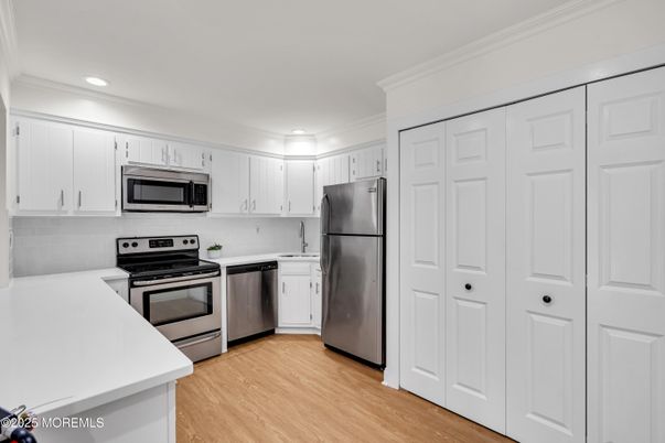 Interior, Kitchen, Recessed Lighting, Stainless Steel Appliances, Wood Texture Flooring