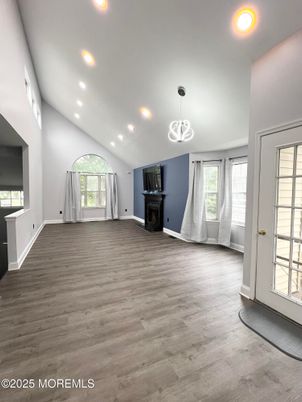 Empty room, Fireplace, Interior, Pendant Lights, Recessed Lighting, Wood Texture Flooring