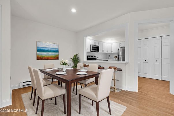 Dining room, Interior, Kitchen, Recessed Lighting, Stainless Steel Appliances, Wood Texture Flooring