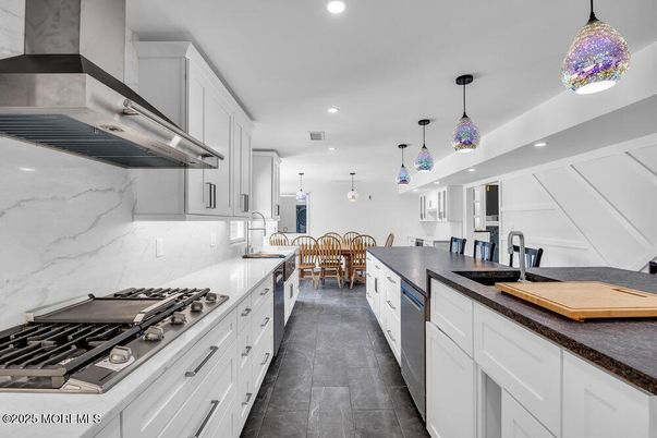 Dining room, Interior, Kitchen, Marble Walls, Pendant Lights, Recessed Lighting, Stainless Steel Appliances