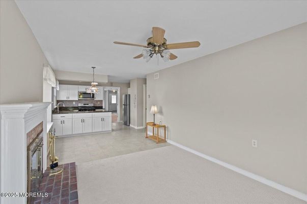 Chandelier, Empty room, Fireplace, Interior, Kitchen, Pendant Lights