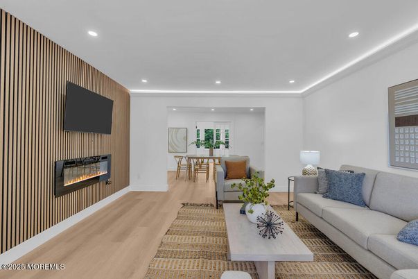 Dining room, Fireplace, Interior, Living room, Recessed Lighting, Wood Texture Flooring