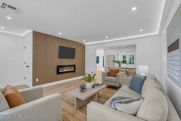 Dining room, Fireplace, Interior, Living room, Recessed Lighting, Wood Texture Flooring