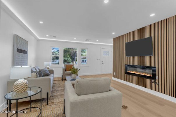 Fireplace, Interior, Living room, Recessed Lighting, Wood Texture Flooring
