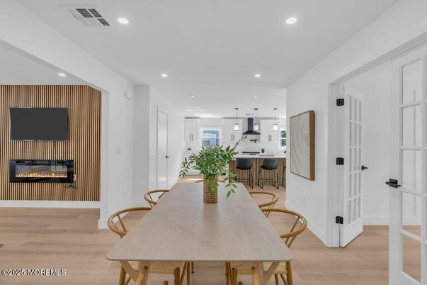 Dining room, Fireplace, Interior, Kitchen, Pendant Lights, Recessed Lighting, Wood Texture Flooring