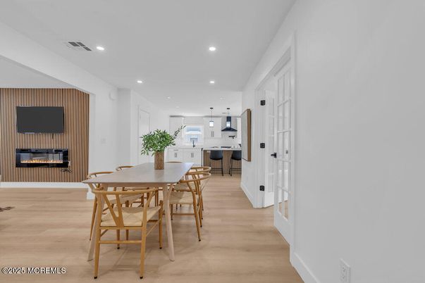 Dining room, Fireplace, Interior, Kitchen, Pendant Lights, Recessed Lighting, Wood Texture Flooring