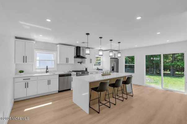 Interior, Kitchen, Pendant Lights, Recessed Lighting, Stainless Steel Appliances, Wood Texture Flooring