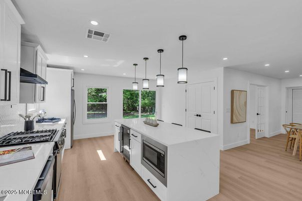 Interior, Kitchen, Pendant Lights, Recessed Lighting, Stainless Steel Appliances, Wood Texture Flooring