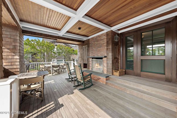 Exterior, Fireplace, Wood Texture Flooring