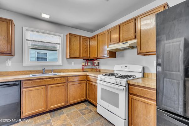 Interior, Kitchen, Recessed Lighting, Tile Countertops