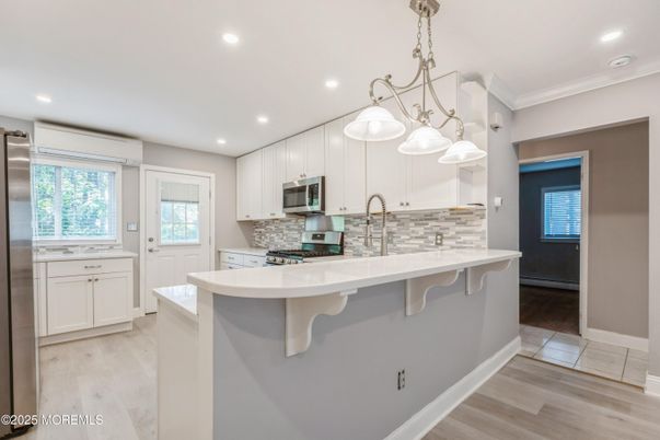 Interior, Kitchen, Pendant Lights, Recessed Lighting, Stainless Steel Appliances, Wood Texture Flooring