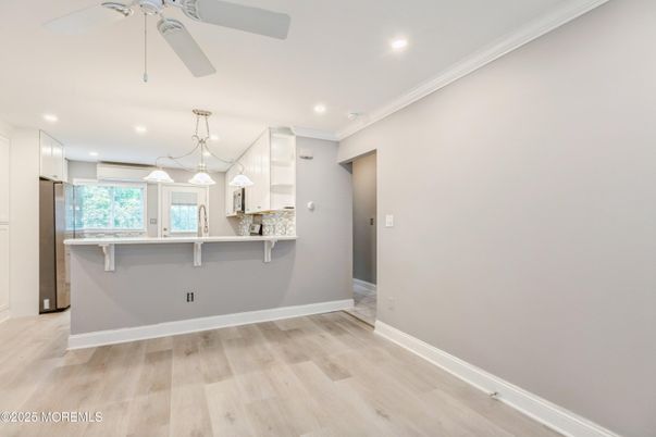 Empty room, Interior, Kitchen, Pendant Lights, Recessed Lighting, Wood Texture Flooring
