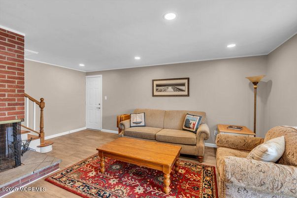 Interior, Living room, Recessed Lighting, Stone Walls, Wood Texture Flooring