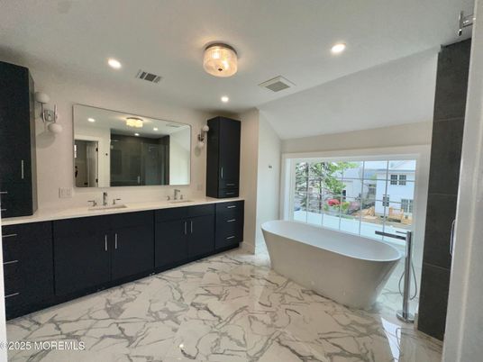 Bathroom, Dual Sink Vanities, Free Standing Baths, Interior, Marble, Recessed Lighting