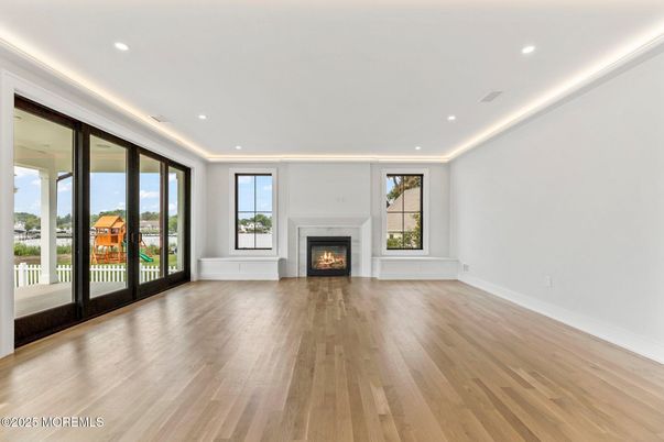 Empty room, Fireplace, Interior, Recessed Lighting, Wood Texture Flooring