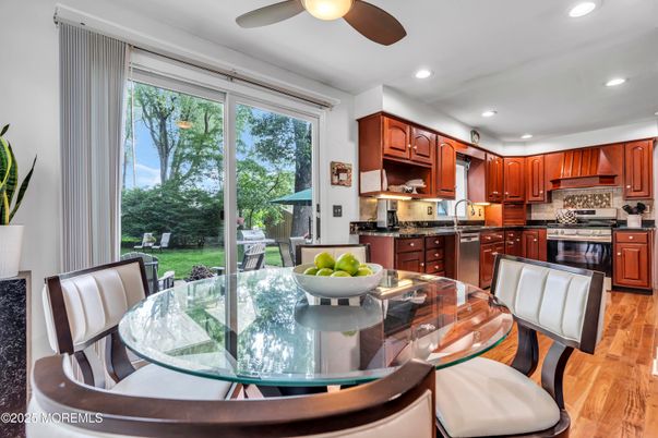 Dining room, Interior, Kitchen, Recessed Lighting, Stainless Steel Appliances, Wood Texture Flooring