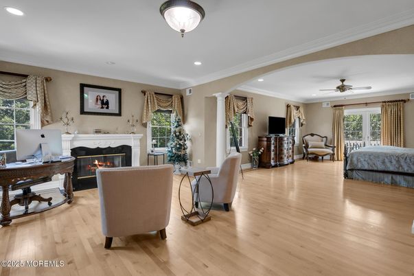 Dining room, Fireplace, Interior, Living room, Recessed Lighting, Wood Texture Flooring