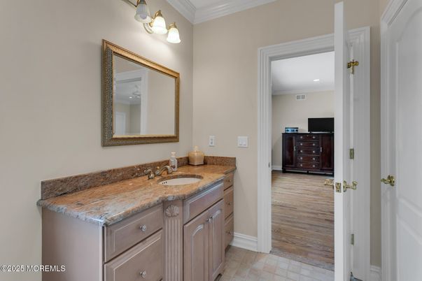 Bathroom, Dual Sink Vanities, Interior, Recessed Lighting, Wood Texture Flooring