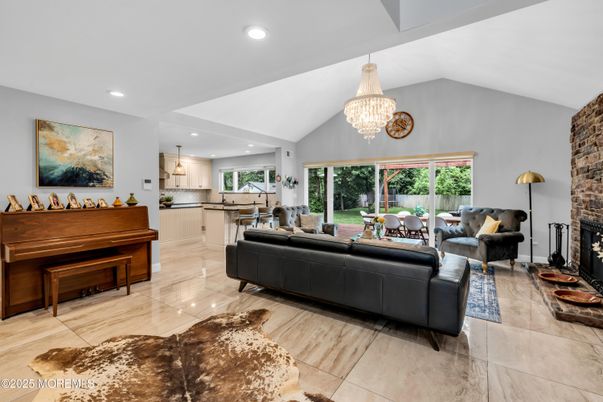 Chandelier, Fireplace, Interior, Living room, Piano, Recessed Lighting